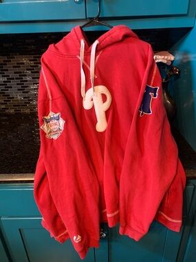 Red Hoodie with Embroidered P with patches  on each sleeve.